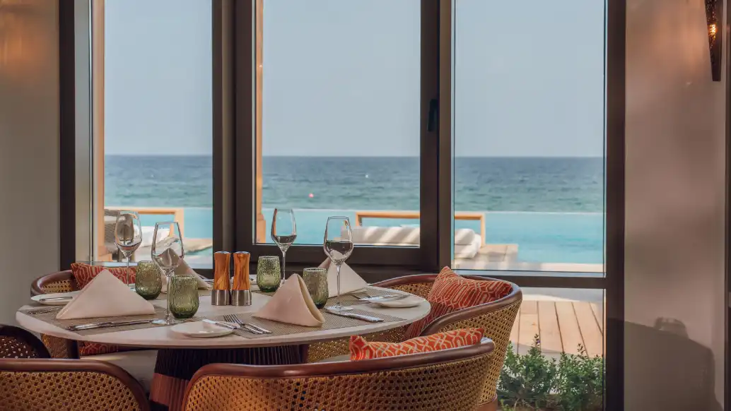 Dining area with a sea view, supplied as event planning reference
